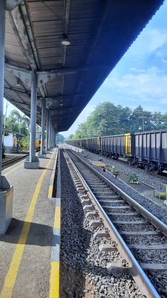 istock Train At Railway Station Against Sky 1455866140