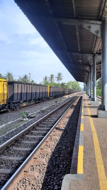 istock Train At Railway Station Against Sky 1455866154