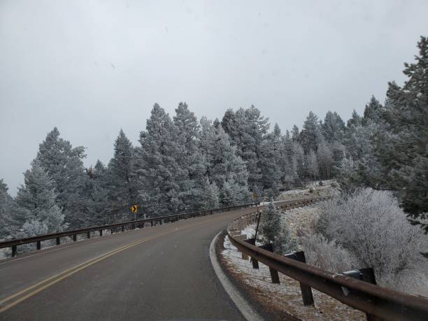 istock Mountain road in winter 1455870187