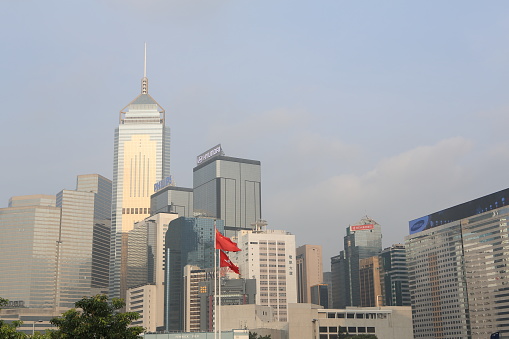 14 June 2012 Hong Kong business office tower with Hong Kong and China flag