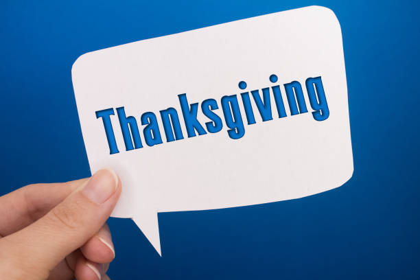 istock Speech bubble in front of colored background with Thanksgiving text. 1455881161