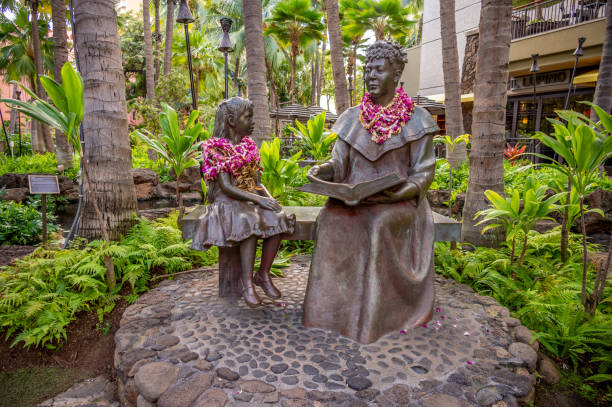 Honolulu, Hawaii - January 1, 2022:  Princess Bernice Pauahi in bronze in the Royal Grove of the Royal Hawaiian Center.