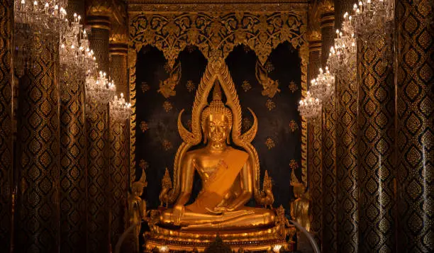 Photo of Phra Buddha Chinnarat one of the most sacred and beautiful Buddha statue in the Thailand located in Wat Phra Sri Rattana Mahathat temple in Phitsanulok province of Thailand.