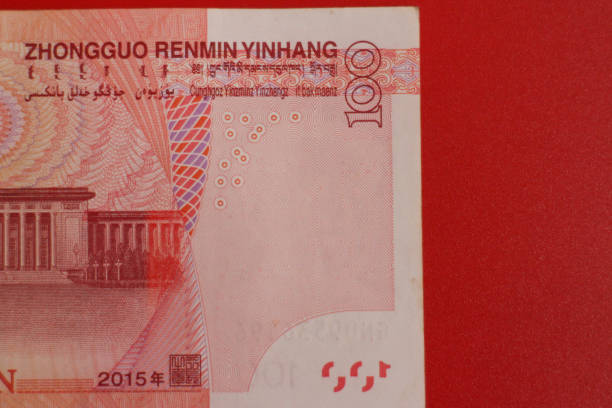 Chinese Money on red Background Mixed Chinese Money , Renminbi, on red background mao original stock pictures, royalty-free photos & images