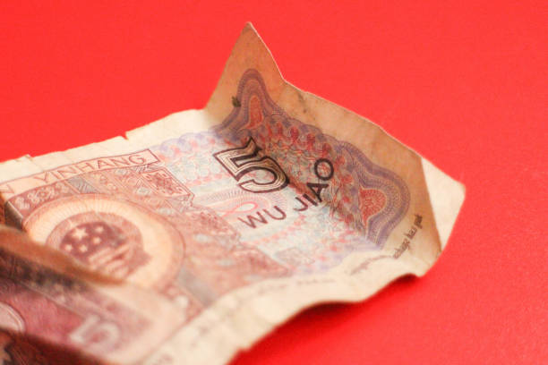 Chinese Money on red Background Mixed Chinese Money , Renminbi, on red background mao original stock pictures, royalty-free photos & images