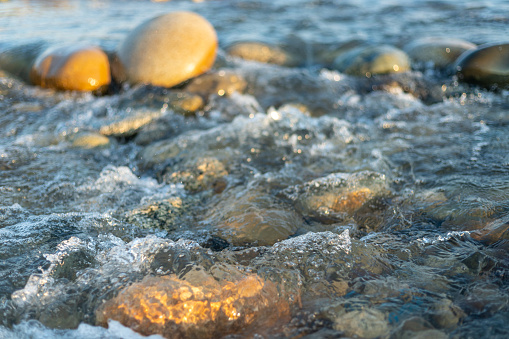 A stones in the running water of a river