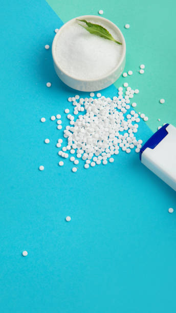 istock Sugar substitute on color background. 1455889530