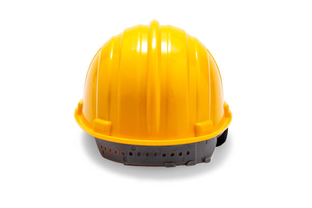 yellow deferential helmet, construction tools for industrial safety isolated on white background. hard hat worker for safe engineer labor maintenance site. protection plastic cap for builder casco deferente amarillo, herramientas de construcción para seguridad industrial aisladas sobre fondo blanco. trabajador de casco para el sitio de mantenimiento de mano de obra de ingeniero seguro. tapa de plástico de protección para el constructor