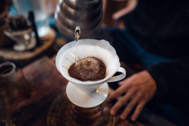 istock Closeup of hands barista make coffee 1455893923