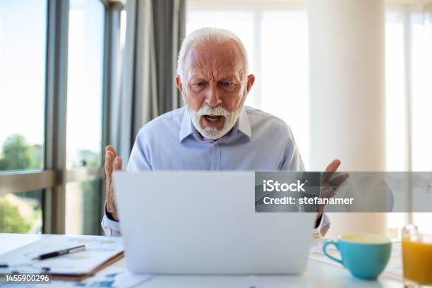 Angry Stressed Business Man Using Laptop Mad About Broken Computer Online Problem Annoyed With Slow Stuck Laptop Error Crazy About System Virus Or Data Loss Outraged With Website Mistake Stock Photo - Download Image Now