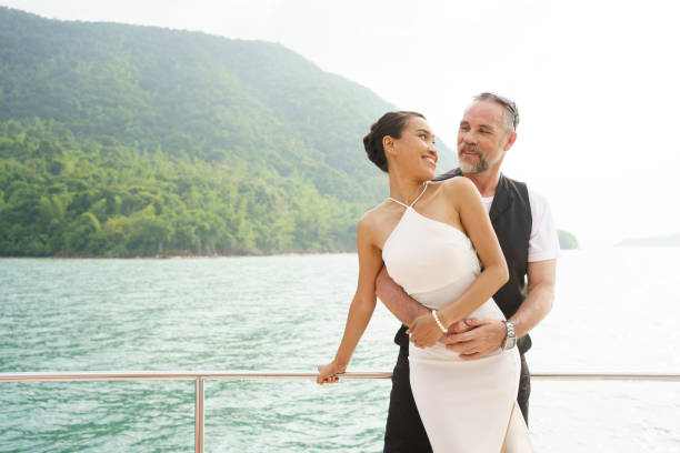 istock Adult couple on yatch. 1455902521