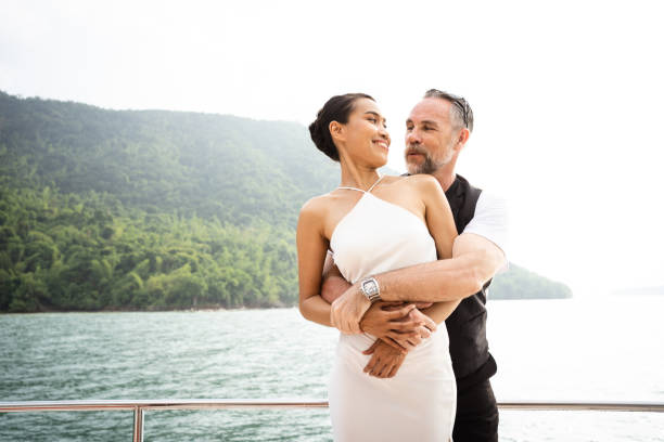 istock Adult couple on yatch. 1455902602
