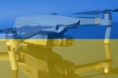 Double exposure of Flag of Ukraine and quadcopter drone aerial camera