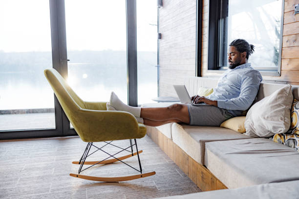 istock Black businesswoman working on a computer from home. 1455912958