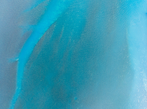Abstract blue colored painted texture background.