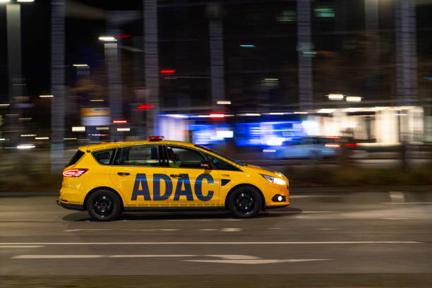 ADAC Car driving through the streets of Hannover. Germany Hannover, Germany – January 01, 2022: The ADAC Car driving through the streets of Hannover. Germany adac stock pictures, royalty-free photos & images