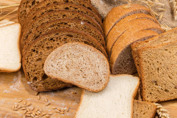 istock Various sliced toast and other bread on cutting board closeup 1455921105