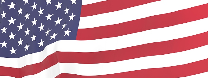 A background of the waving flag of the USA stars and stripes flag