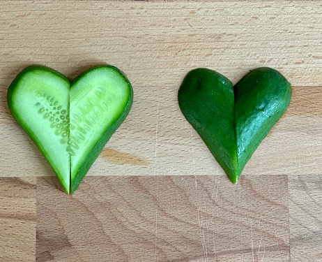 heart shape cucumber on wooden board
