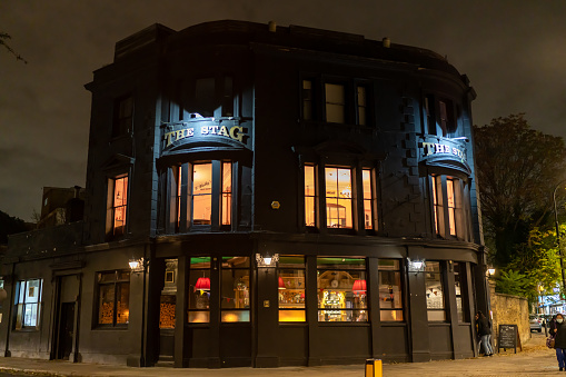 London, United Kingdom – October 28, 2021: A closeup of the Stag Pub at night in North London