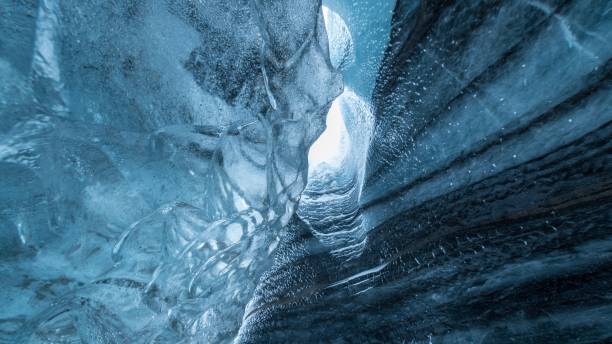 istock Inside view of large ice boulder in a cave in Iceland 1455929062