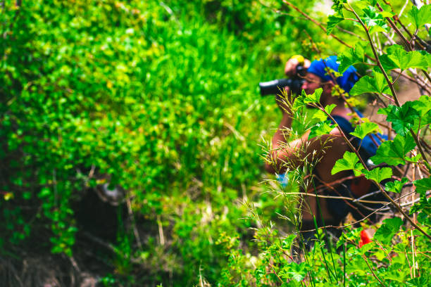 istock Photographer taking a picture in nature 1455929266