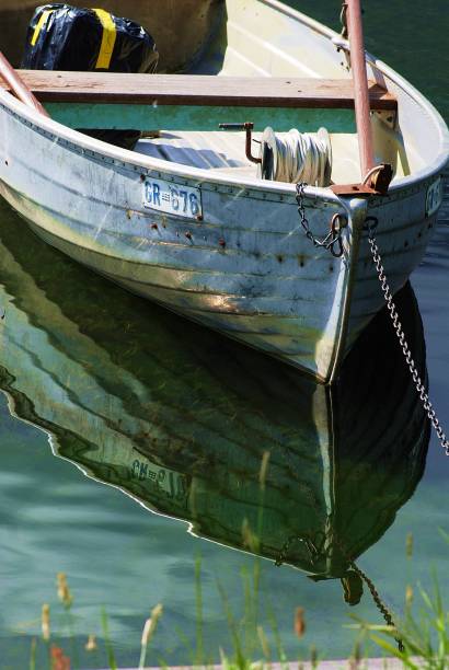 istock Closeup of a boat with its reflection in the water 1455929341