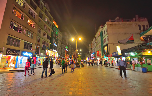 Gangtok, India - September 05, 2018: People walking in the MG Marg street at night.