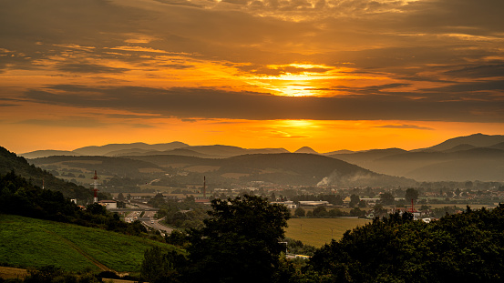 A scenic landscape with mountains during sunset in Trencin, Slovakia