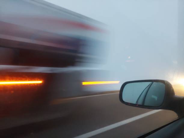 istock Blurred shot of passing car lights from a car window 1455930622