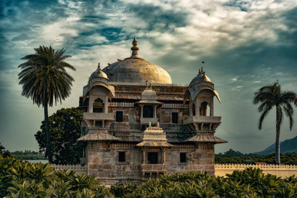 Historic temple on an Island at Lake Pichola in Udaipur, Rajasthan, India A historic temple on an Island at Lake Pichola in Udaipur, Rajasthan, India udaipur stock pictures, royalty-free photos & images