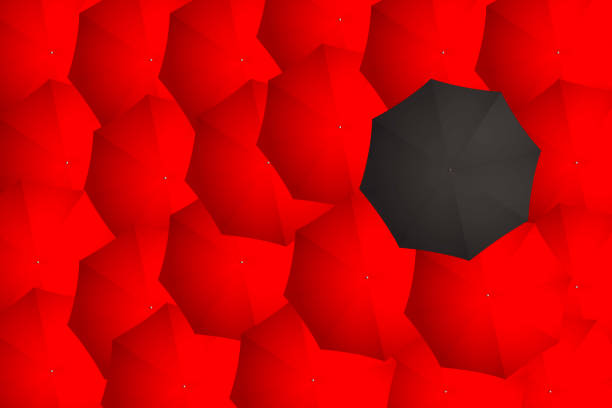 istock Black Umbrella Over Many red Umbrellas. The Background is Colorful, an Umbrella is Like a Salvation from the Rain. Seasonal Symbol 1455931021