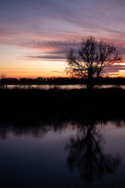 istock Beautiful sunset over a lake 1455932558