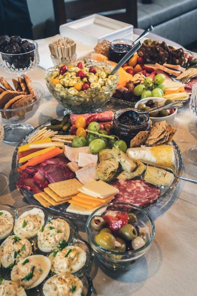 Table full of salads and assortments