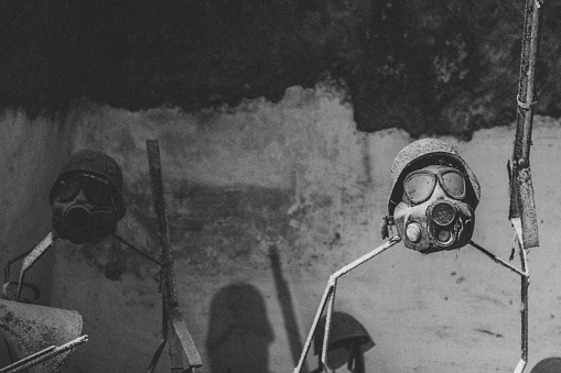 War time gas masks in grayscale