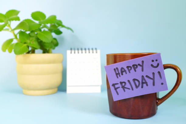 istock Welcome, hello and happy Friday concept. Selective focus of coffee cup with purple paper note and written message. 1455935868
