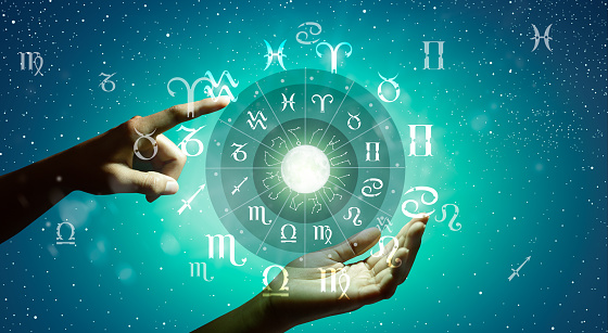 Astrological zodiac signs inside of horoscope circle. Astrology, knowledge of stars in the sky over the milky way and moon. The power of the universe concept.