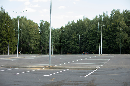 Empty parking. Large area for cars. Parking place. Marking on asphalt.