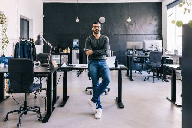 Confident Young Latin businessman at the office