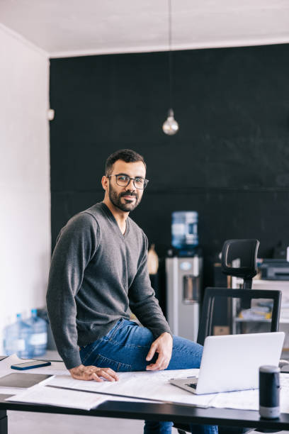 istock Confident Young Latin businessman at the office 1455943828