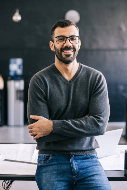 istock Confident Young Latin businessman at the office 1455943850