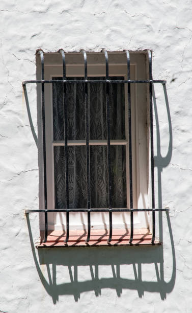 istock old wooden window of a house 1455946084