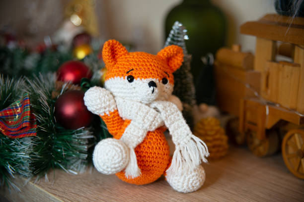 istock Crochet handmade fox with scarf 1455946240
