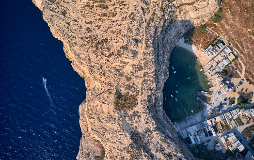 An aerial shot of the inland sea Gozo at Dwejra bay in Malta