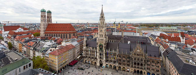 Overview of the sea of houses in the historic old town of Munich with the Frauenkirche, Marienplatz and the New City Hall