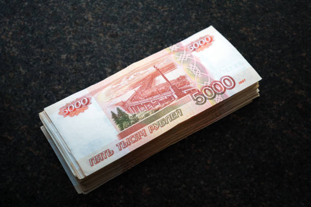 Stack of banknotes of 5000 Russian rubles on dark background