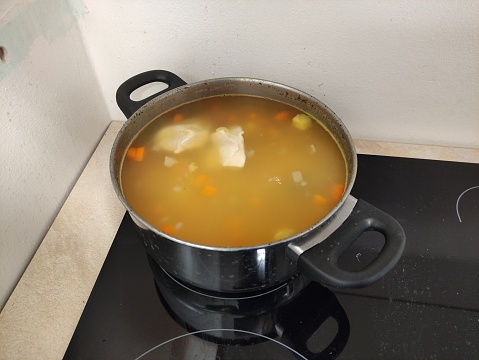 Pea soup in a pot on a stove