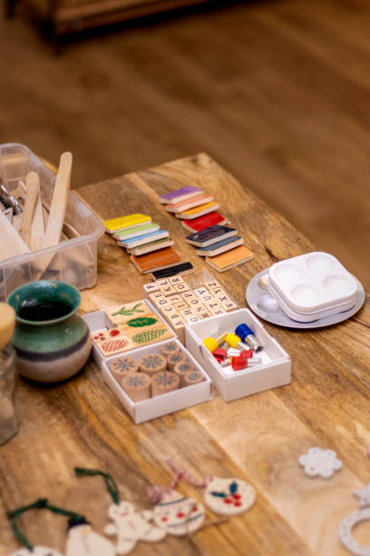 istock Ceramics workshop. Lettering stamps and Christmas shapes. 1455954915