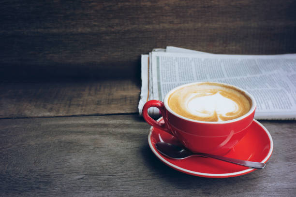 Coffee Shop Cafe Latte Cappuccino Newspaper on the table  Concept  selective focus.