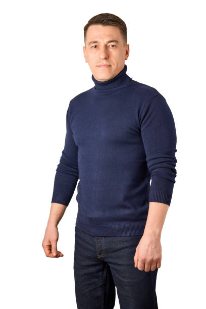 istock Young man wearing blue turtleneck sweater and jeans 1455957262